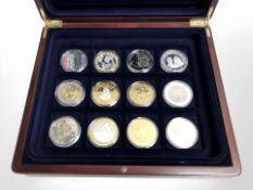 A coin collectors case containing commemorative crowns, including Battle of Britain,