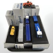 A group of Atlas Editions World of Stobart 1:76 scale die cast wagons, earth moving vehicles, etc,