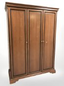 A Stag triple door wardrobe,