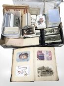 A collection of antique and later postcards, loose and in albums, other ephemera.