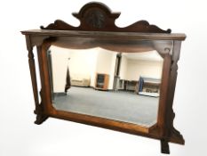A late Victorian mahogany over mantle mirror, 123 cm x 15 cm.