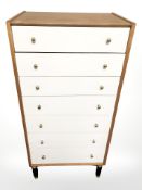 A G Plan teak seven drawer tallboy, designed by E. Gomme, 60 cm x 41 cm x 128 cm.
