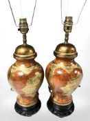A pair of contemporary decorative lamp bases, height 39 cm excluding fittings.