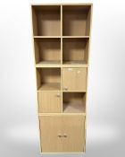 Three contemporary cube shelves/cupboards,