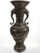 A late 19th century Japanese patinated bronze twin handled vase, height 41 cm.
