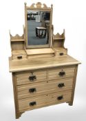 An Edwardian satin walnut four drawer dressing chest,
