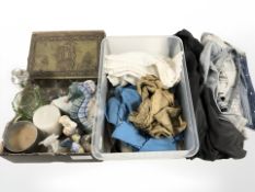 An embossed brass box containing shoe shine brushes and polish, assorted drinking glasses,