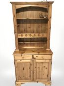 A contemporary pine dresser,