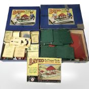 Two Bayko building sets.