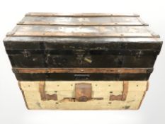 An antique pine and metal cupboard/trunk and a further canvas trunk,