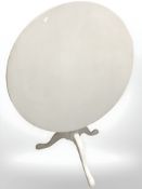 A painted pine tripod table,