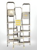 Three aluminium step ladders