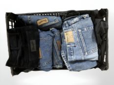 Several pairs of Wrangler denim jeans