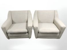 A pair of 20th century lounge armchairs in oat meal coloured fabric,