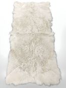 A good quality goat skin rug 160 cm x 77 cm