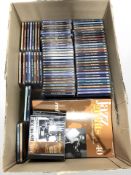 A collection of jazz greats CDs and accompanying magazines.