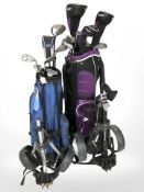 Two golf bags on caddies containing assorted irons and drivers including Calloway,