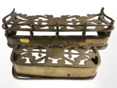 Two Victorian miniature brass fenders, largest 29 cm wide.