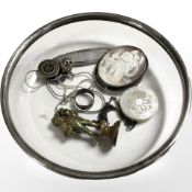 A silver-rimmed glass bowl, diameter 15.