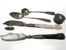 A Georgian silver caddy spoon, further teaspoon, two decorative silver knives,