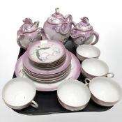 Twenty pieces of Japanese export porcelain tea china on pink ground.