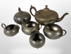 A group of 19th century hammered pewter tea wares
