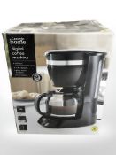 A digital coffee machine, in box.