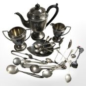 An EPNS teapot, milk jug, trophy cup, assorted cutlery.