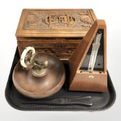 An Eastern carved wooden jewellery box, a metronome,