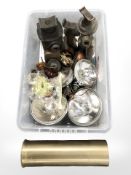 A large brass ammunition shell casing, vintage car headlamps and bulbs, cast iron hydraulic jacks.