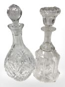 A cut crystal decanter with stopper, height 17 cm, plus another.
