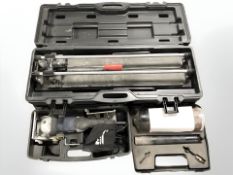 A tile cutter, McAllister biscuit joiner, drill bit set,