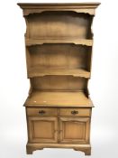 A Stag dresser, 91 cm x 46 cm x 199 cm.