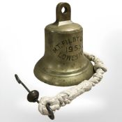 A brass ships bell marked 'M. T. Filby Queen, 1955, Lowestoft', height 22 cm, with clapper.