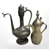 A Turkish brass sparrow beak teapot and a further Eastern teapot,