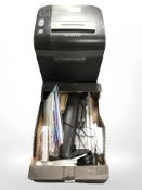 A paper shredder, assorted stationary, paper guillotine, etc.