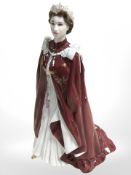 A Royal Worcester figure of Queen Elizabeth II, in celebration of the Queen's 80th birthday, 2006.
