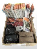 A collection of ordnance survey maps, digital cameras.