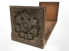 A 19th century carved oak bookstand, width 38 cm.