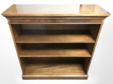 A Bradley reproduction mahogany open bookcase,