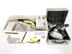 A Karcher steam cleaner and two electric drills in carry case