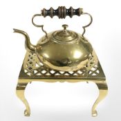 A brass footman and a teapot.