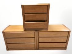 A Hulsta three drawer bedside chest and a further pair of larger chests,