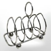 A silver five bar toast rack by Walker & Hall, Sheffield, width 10 cm.