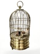 A 20th century bird automaton clock, height 16.5 cm.