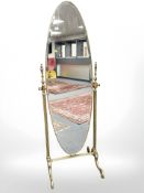 A contemporary brass cheval mirror,