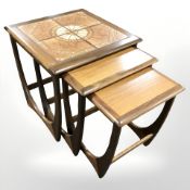 A G Plan teak nest of three tiled inset tables,