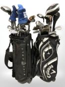 Two golf bags containing assorted irons and drivers, including Dunlop, Instinct, Mizuno, Cleveland,