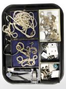 A group of costume pearls, earrings, quartz wristwatches, etc.