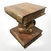 A hardwood lamp table in the form of a stack of books,